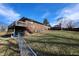 Brick house with deck, stairs, and fenced backyard at 3163 S 25 E, Shelbyville, IN 46176