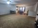 Spacious living room with hardwood floors and a view into the dining area at 3163 S 25 E, Shelbyville, IN 46176
