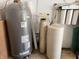 Utility room features water heater and water filtration system at 3163 S 25 E, Shelbyville, IN 46176