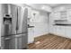 Modern kitchen featuring stainless steel appliances and white cabinetry at 320 W 6Th St, Muncie, IN 47302