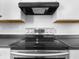 Stainless steel range with overhead vent hood at 320 W 6Th St, Muncie, IN 47302