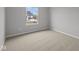 This cozy bedroom has a window, neutral walls, carpet, and closet at 4183 Douro Trl, Westfield, IN 46062