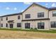 Rear exterior showcasing siding, glass doors, and grassy area at 4183 Douro Trl, Westfield, IN 46062
