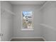 Walk-in closet featuring wire shelving and a window offering a view at 4183 Douro Trl, Westfield, IN 46062