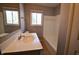 Clean bathroom with a white tub and vanity at 4820 E 70Th St, Indianapolis, IN 46220