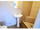 Clean bathroom with pedestal sink and tiled shower at 4820 E 70Th St, Indianapolis, IN 46220