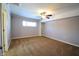Large bedroom with ceiling fan and built-in shelving at 4820 E 70Th St, Indianapolis, IN 46220