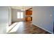Spacious dining room, hardwood floors, and a view to the kitchen at 4820 E 70Th St, Indianapolis, IN 46220