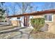 Side view of the house entrance with landscaping at 4820 E 70Th St, Indianapolis, IN 46220
