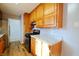 Kitchen with oak cabinets, granite countertops and stainless steel appliances at 4820 E 70Th St, Indianapolis, IN 46220