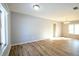Living room featuring hardwood floors and access to the outdoors at 4820 E 70Th St, Indianapolis, IN 46220
