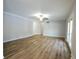 Large living room with hardwood floors and French doors at 4820 E 70Th St, Indianapolis, IN 46220