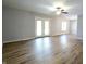 Spacious living room with hardwood floors and ceiling fan at 4820 E 70Th St, Indianapolis, IN 46220