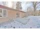 Concrete patio area adjacent to the house, partially covered in snow at 4820 E 70Th St, Indianapolis, IN 46220