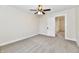 Simple bedroom with carpet and access to hall at 4992 W 100 S, New Palestine, IN 46163