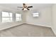 Well-lit bedroom with neutral walls and carpet flooring at 4992 W 100 S, New Palestine, IN 46163