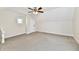 Bright attic bedroom featuring neutral walls and carpeting at 4992 W 100 S, New Palestine, IN 46163