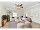 Virtually staged living room featuring a comfortable sectional sofa and coffee table at 4992 W 100 S, New Palestine, IN 46163