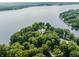 Island home with lake access and lush landscaping at 5101 Green Braes E Dr, Indianapolis, IN 46234