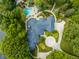 Luxury home with circular driveway and extensive landscaping at 5101 Green Braes E Dr, Indianapolis, IN 46234