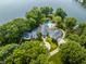 Luxury home on a private island with a pool and lake access at 5101 Green Braes E Dr, Indianapolis, IN 46234