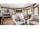 Bright bedroom with white bedding and window shutters at 5101 Green Braes E Dr, Indianapolis, IN 46234