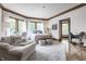 Bright bedroom with a comfortable sitting area and plenty of natural light at 5101 Green Braes E Dr, Indianapolis, IN 46234