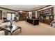 Spacious home office with built-in bookshelves and desk at 5101 Green Braes E Dr, Indianapolis, IN 46234