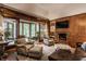 Bright living room with access to a sunroom and lake view at 5101 Green Braes E Dr, Indianapolis, IN 46234
