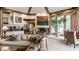 Elegant living room featuring a large sectional sofa and a beautiful aquarium at 5101 Green Braes E Dr, Indianapolis, IN 46234