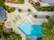 Geometric pool and spacious patio area with lounge chairs at 5101 Green Braes E Dr, Indianapolis, IN 46234
