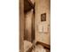 Spa-like shower with marble tile and a frameless glass enclosure at 5101 Green Braes E Dr, Indianapolis, IN 46234