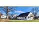 Exterior view of multiple buildings and main farm house on the property at 5420 Mcfarland Rd, Indianapolis, IN 46227