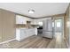 Modern kitchen featuring white cabinets, updated appliances, and light countertops at 5420 Mcfarland Rd, Indianapolis, IN 46227