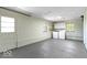 Bright laundry room with washer, dryer, storage, and natural light at 5420 Mcfarland Rd, Indianapolis, IN 46227