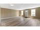 Spacious open-plan living room with large windows offering ample natural light at 5420 Mcfarland Rd, Indianapolis, IN 46227