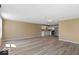 Expansive living room flows into a well-equipped kitchen with stainless appliances at 5420 Mcfarland Rd, Indianapolis, IN 46227