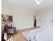 Bright primary bedroom with a sitting area, hardwood floors and lots of natural light at 5420 Mcfarland Rd, Indianapolis, IN 46227