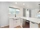 Kitchen with a large window, subway tile, and a farmhouse sink at 5630 Winthrop Ave, Indianapolis, IN 46220