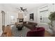 Inviting living room with stone fireplace, hardwood floors, and stylish decor at 5630 Winthrop Ave, Indianapolis, IN 46220