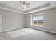 Bright bedroom with ceiling fan and window seat at 6207 Preserve Way, McCordsville, IN 46055