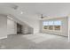 Bright bonus room featuring a large window and ceiling fan at 6207 Preserve Way, McCordsville, IN 46055