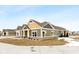 Side view of charming craftsman style home with gray and yellow exterior at 6207 Preserve Way, McCordsville, IN 46055