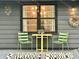 Charming patio area with table and chairs, perfect for outdoor relaxing and enjoying a quiet afternoon at 6220 Dean Rd, Indianapolis, IN 46220