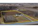 Aerial view of a home on a large lot, surrounded by farmland at 9222 W State Road 38, Lapel, IN 46051