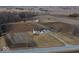 Aerial view of a home on a large lot, surrounded by farmland at 9222 W State Road 38, Lapel, IN 46051