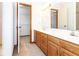 Bathroom featuring dual sinks, spacious vanity and walk-in closet at 9222 W State Road 38, Lapel, IN 46051