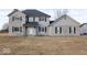 Charming two-story home with gray siding, blue shutters, and a well-maintained front yard at 9222 W State Road 38, Lapel, IN 46051