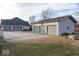 The home has a three-car detached garage on a concrete foundation at 9222 W State Road 38, Lapel, IN 46051