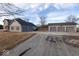A view of a three-car detached garage, along with the home's connected two-car garage at 9222 W State Road 38, Lapel, IN 46051